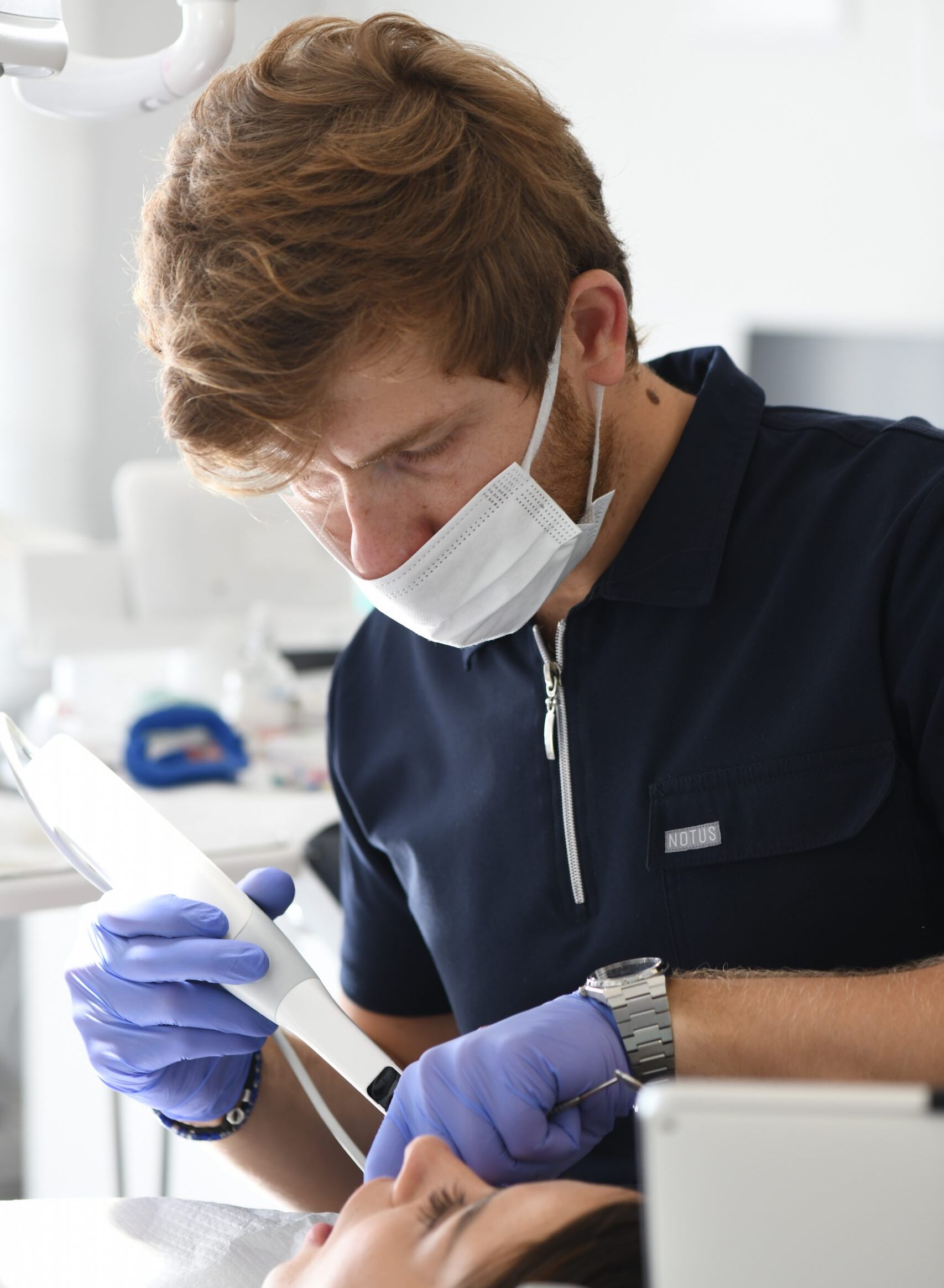 dentist working for digital impression