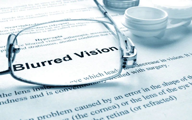 blurred vision woman with glasses